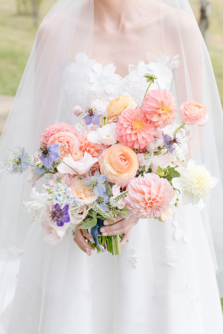 brides colorful bouquet at her destination wedding in jackson hole 