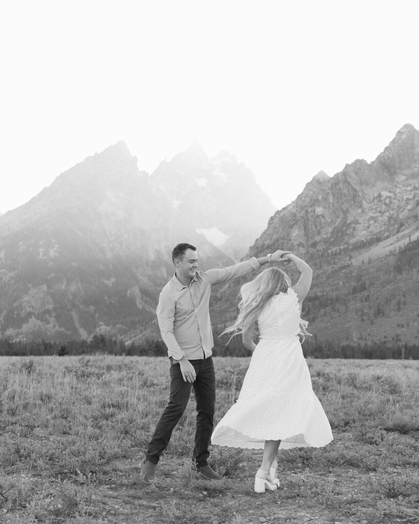 couple dancing in the mountains- engagement photo ideas
