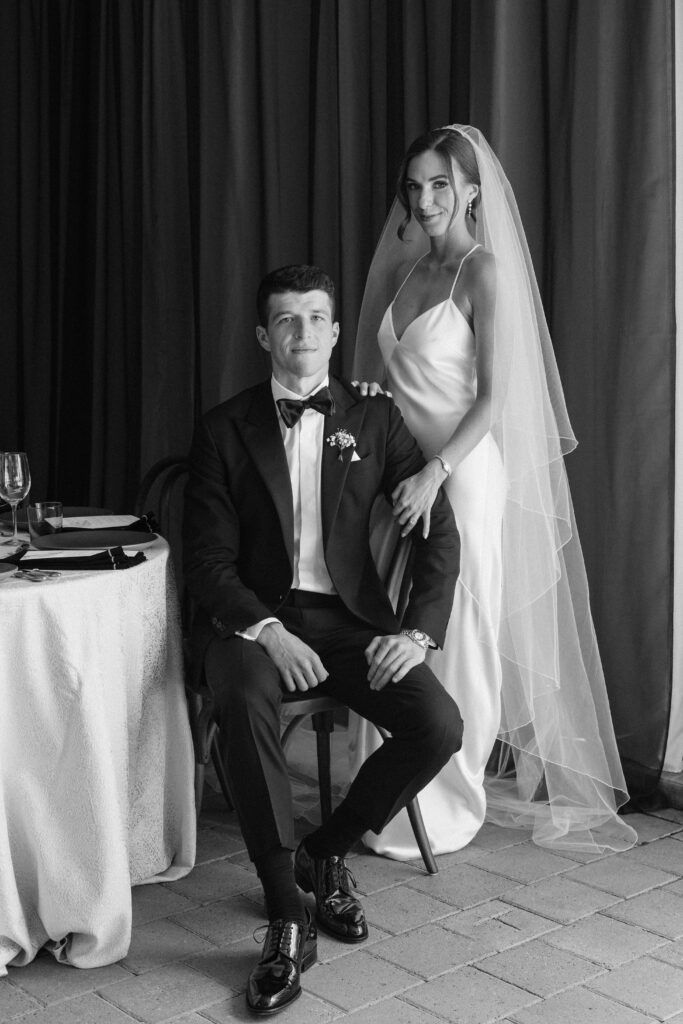 bride and groom in an elegant black and white photo