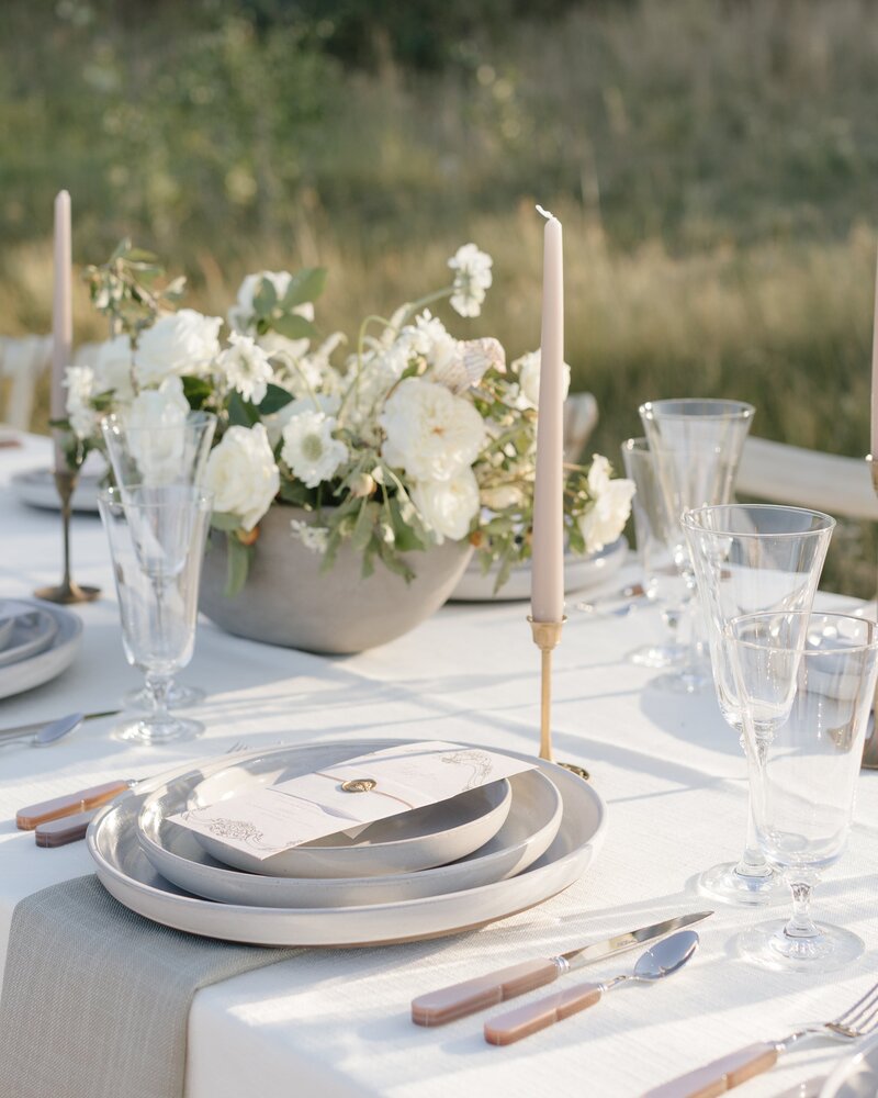 stunning table arrangements at an outdoor wedding dinner in Jackson Hole