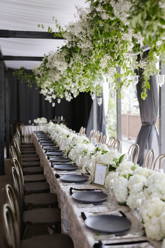 the most stunning reception tables with hanging flowers