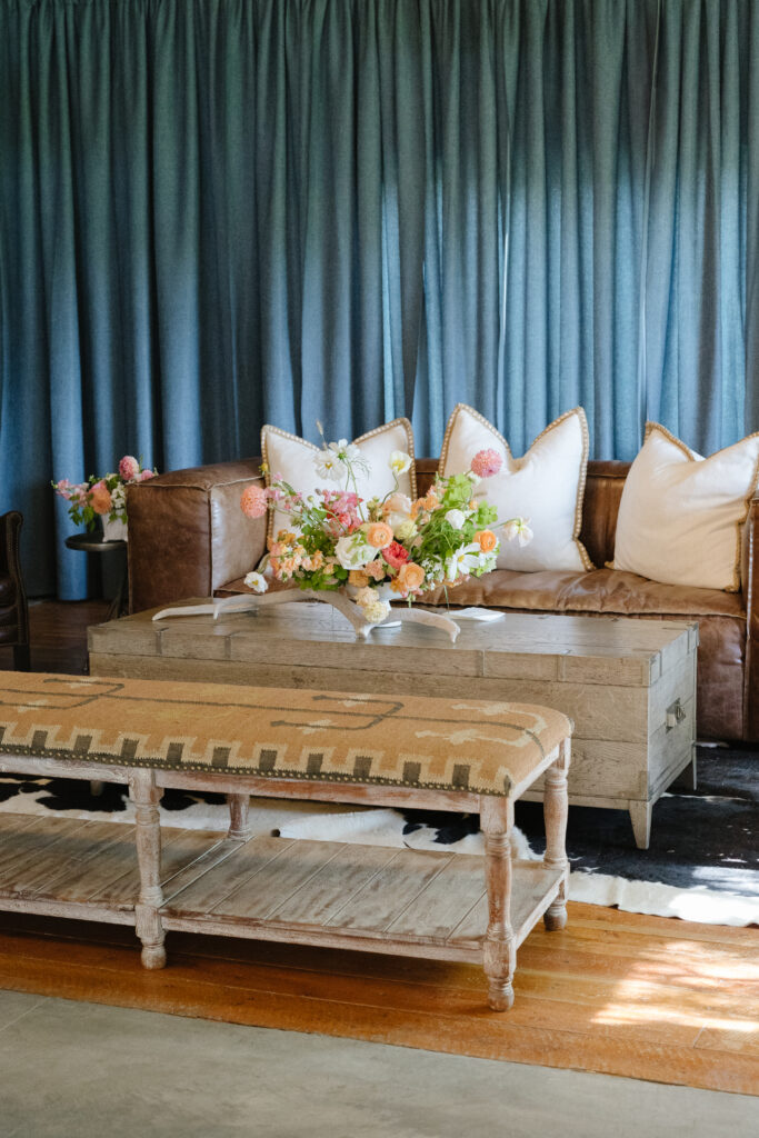 couch gathering area in the reception barn