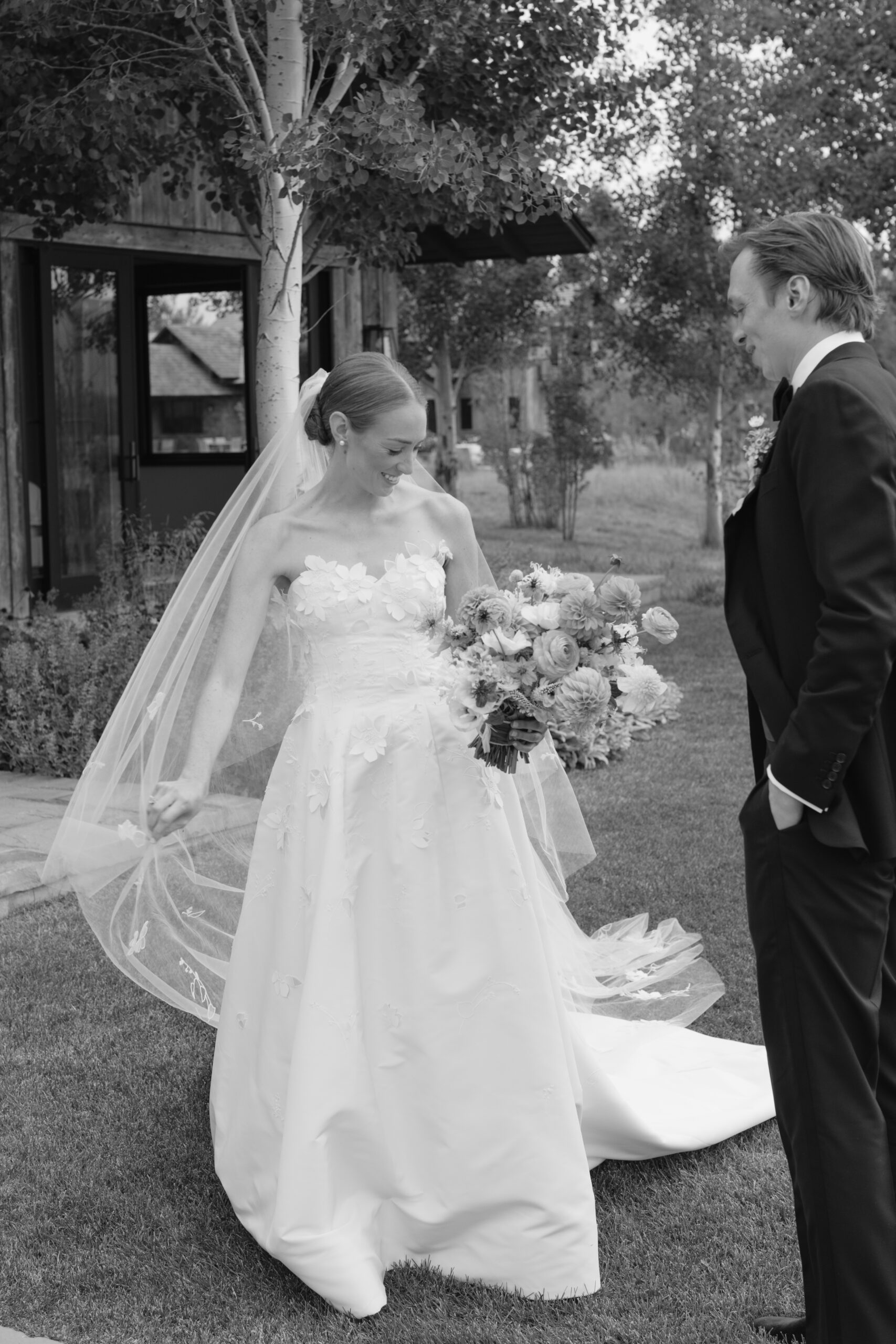 bride doing a spin for her new husband during their Grand Teton Elopement 