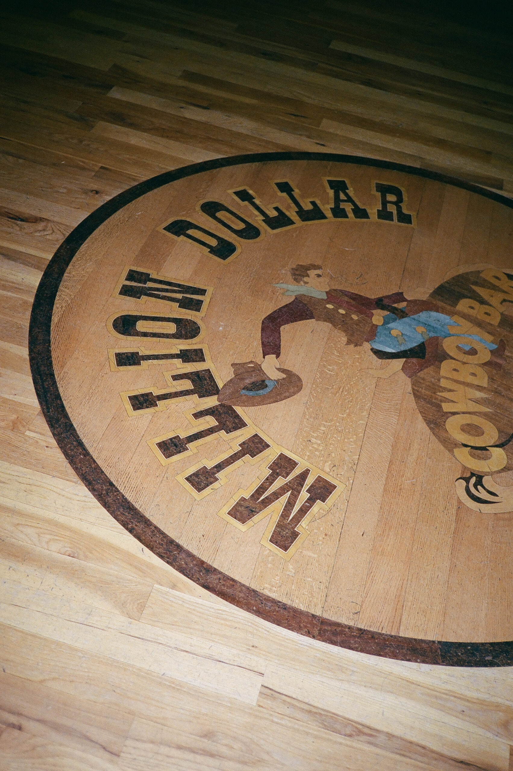million dollar cowboy bar signage