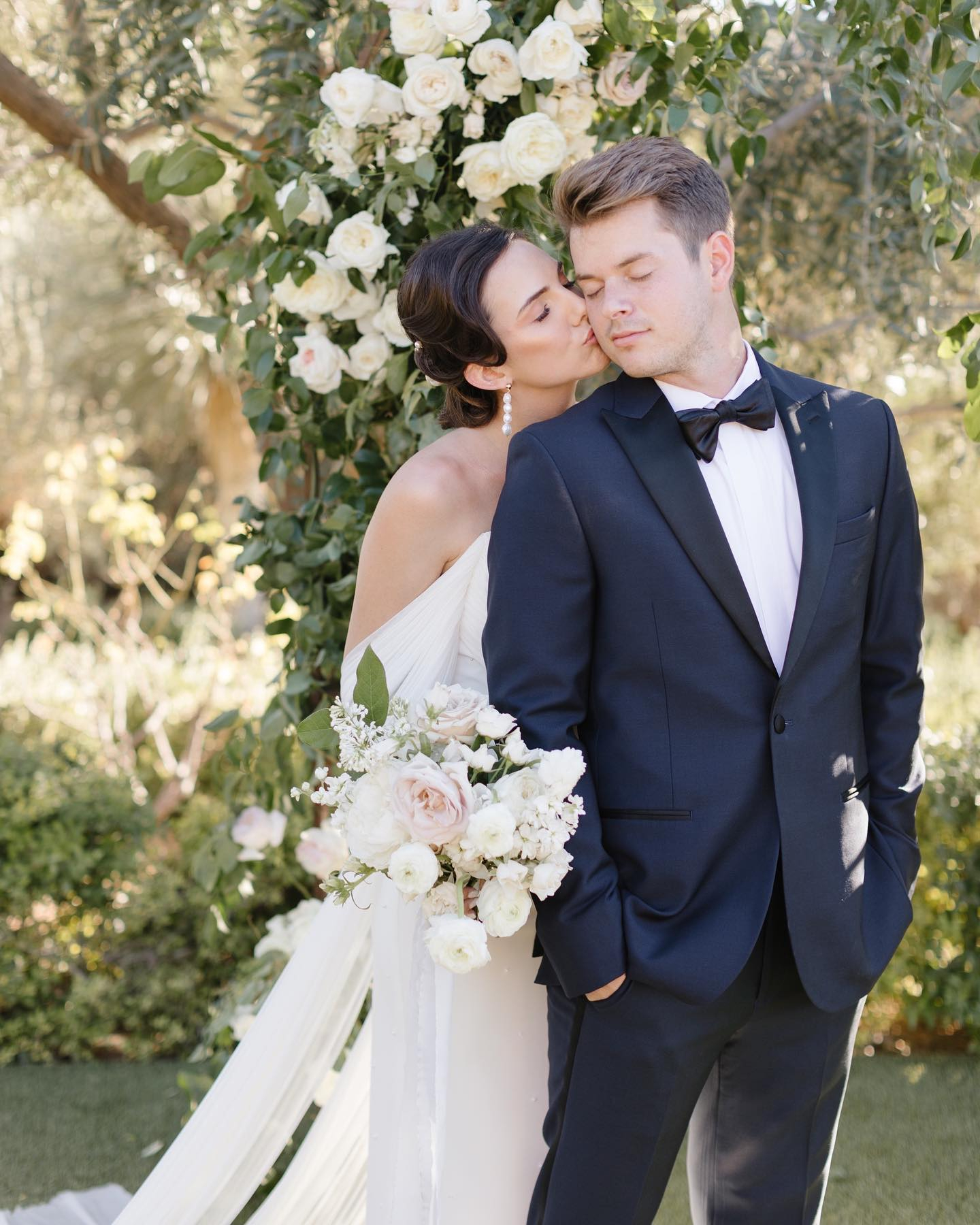 eloping-in-jackson-hole wife kissing her new husband - wedding weekend itinerary