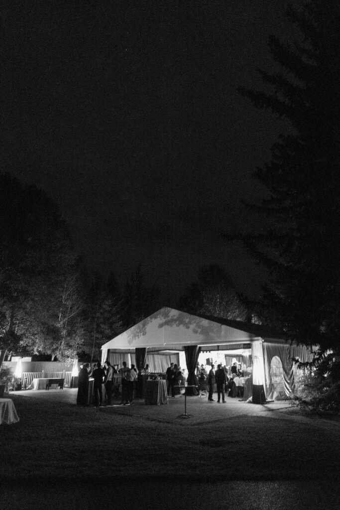 Evening reception glows under the stars at Jackson Hole Golf and Tennis Club—pure magic in the mountains.