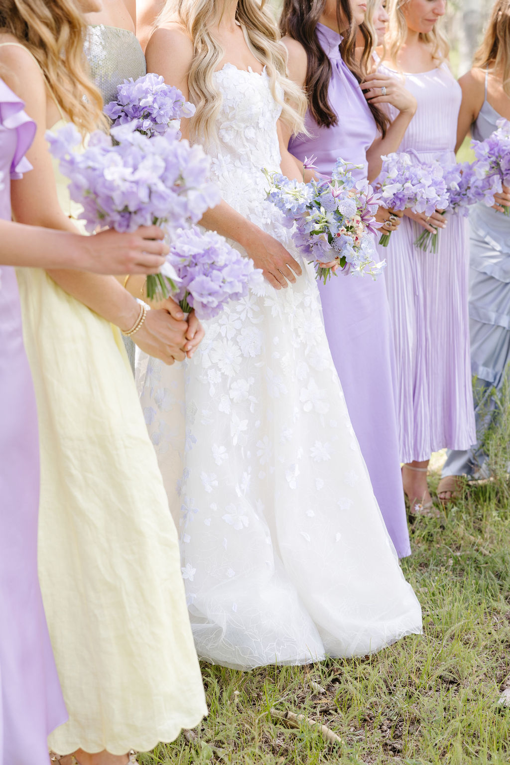 Details of bridesmaid and bridal gown.