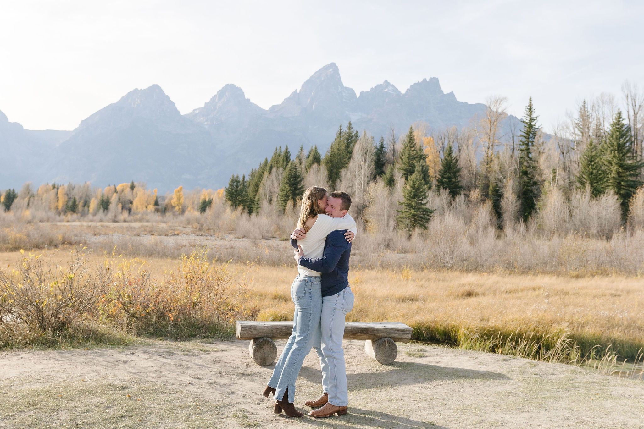 Surprise proposal photographer in Jackson Hole and Grand Tetons captures proposal at Schwabacher Landing.