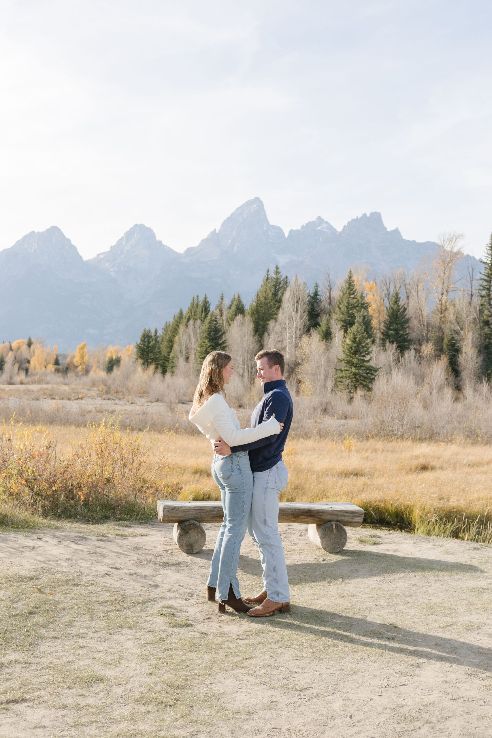Surprise proposal photographer in Jackson Hole and Grand Tetons captures proposal at Schwabacher Landing.