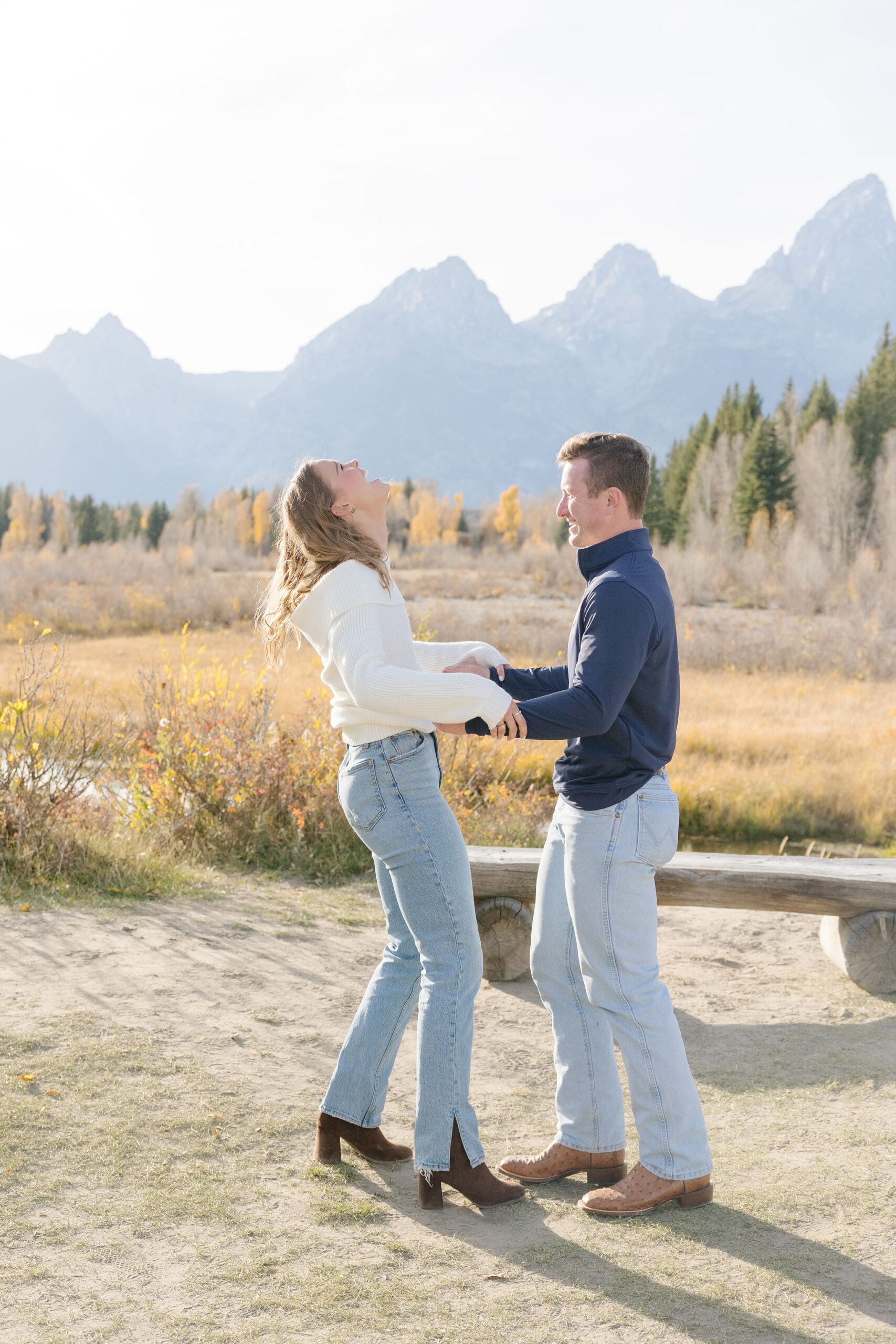 Surprise proposal photographer in Jackson Hole and Grand Tetons captures proposal at Schwabacher Landing.