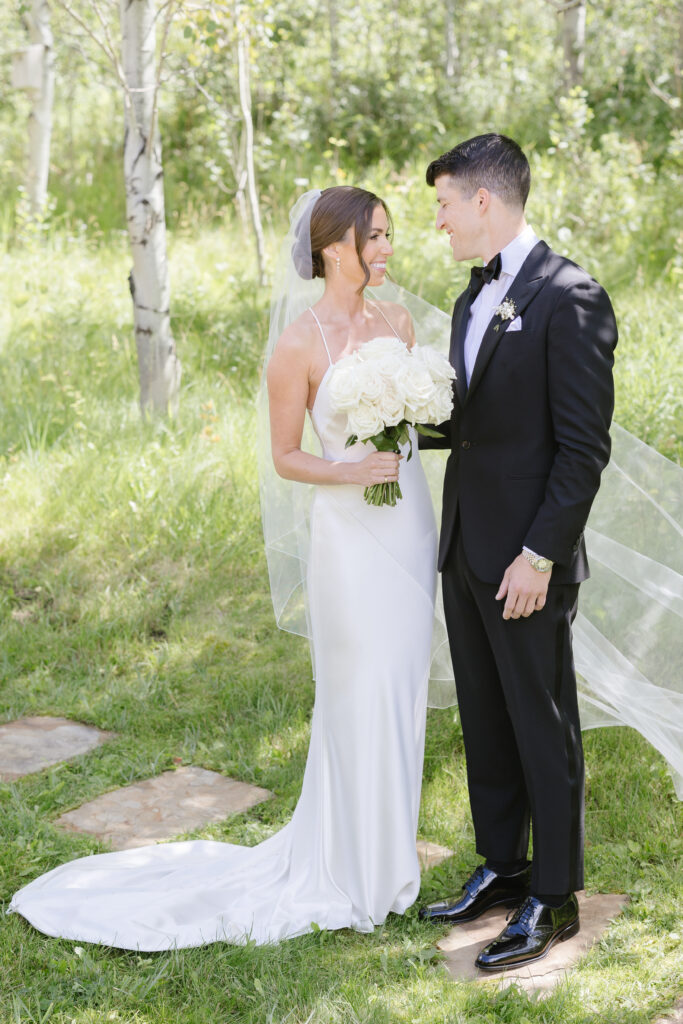 Catholic wedding photographer in Jackson Hole captures portraits of bride and groom.