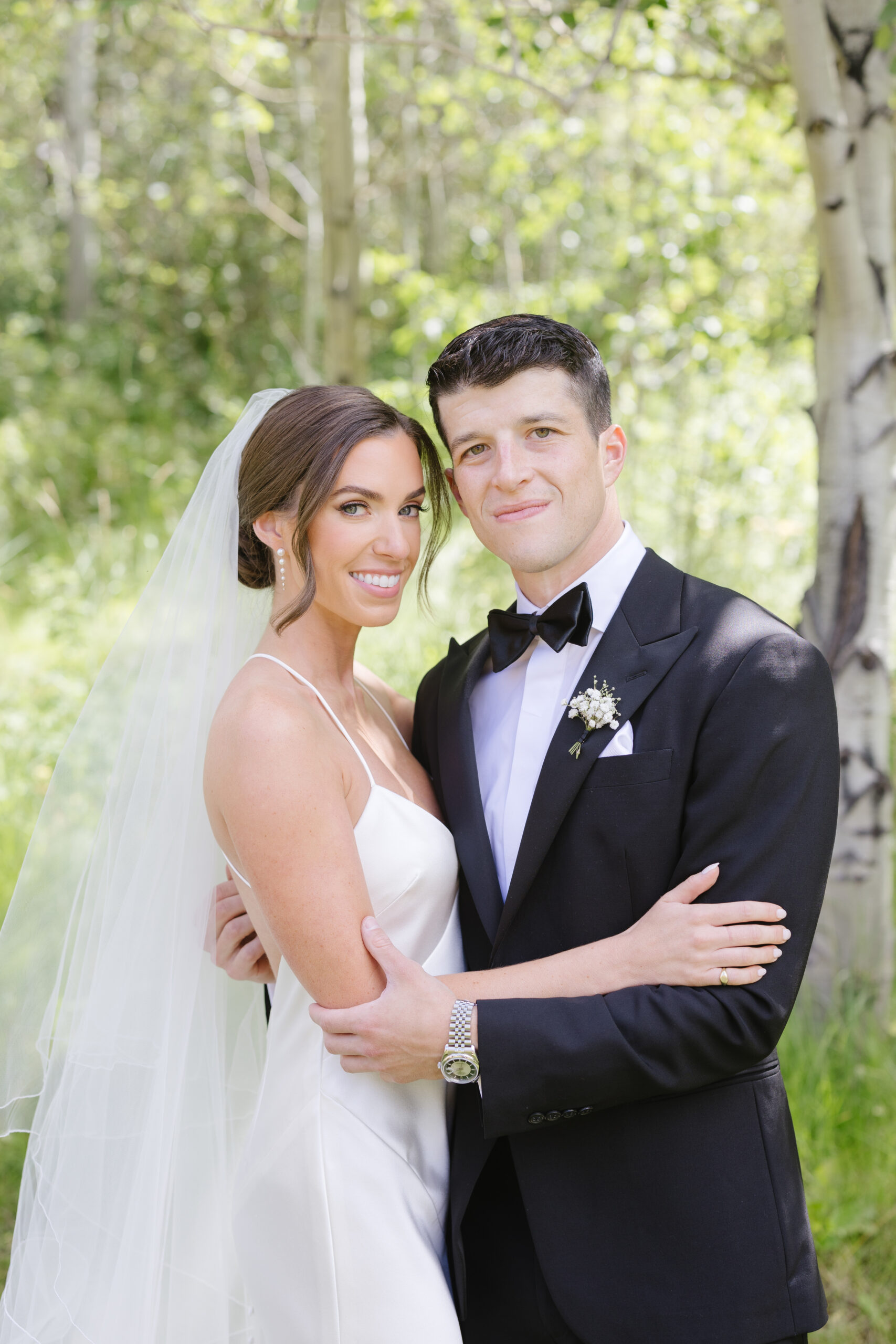 Catholic wedding photographer in Jackson Hole captures portraits of bride and groom.