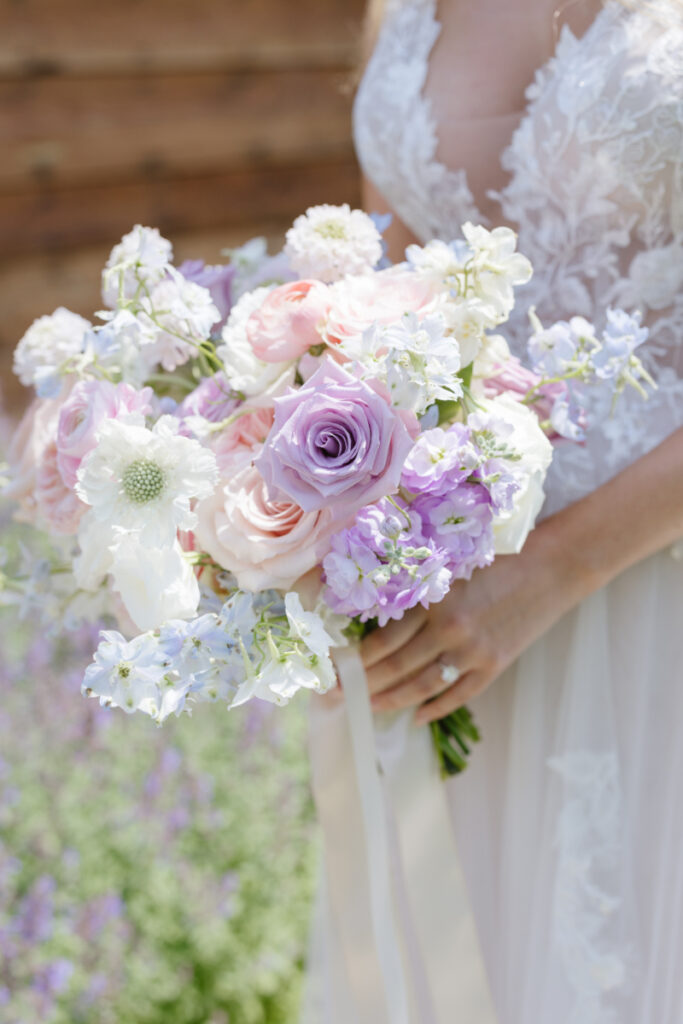 Detail shot of bridal bouquet and ring.