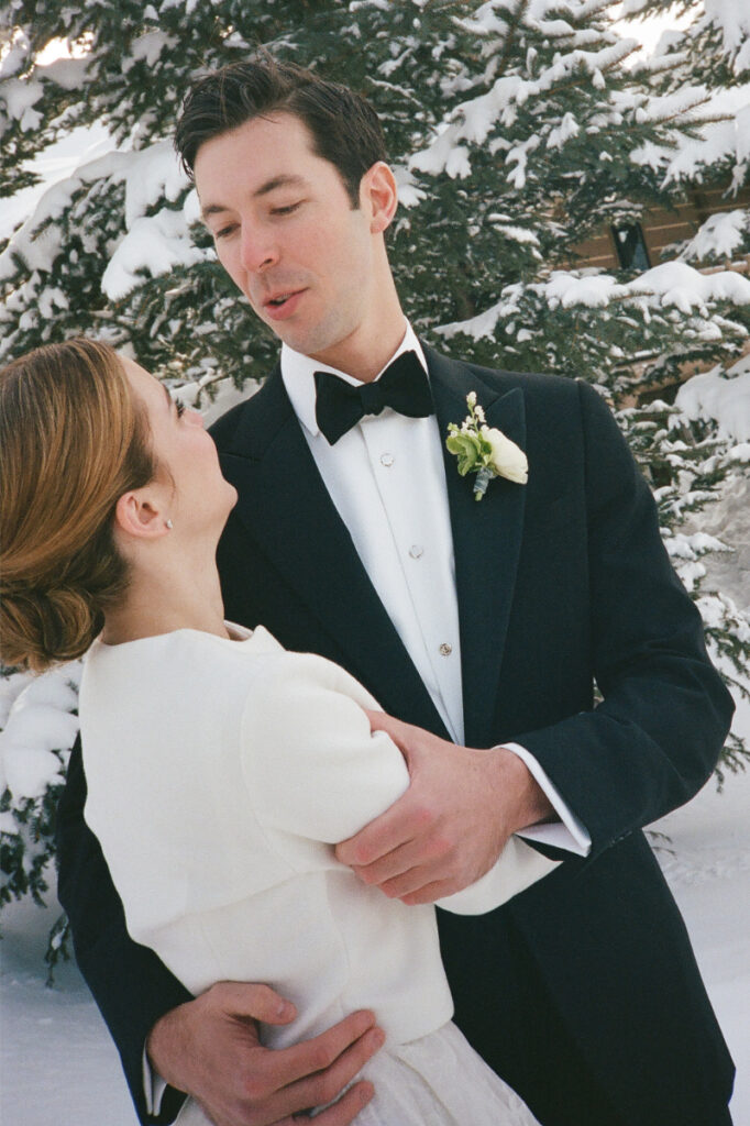 Bride and groom take portraits in one of the most beautiful Wyoming wedding locations.