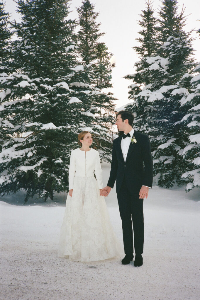 Bride and groom take portraits in one of the most beautiful Wyoming wedding locations.