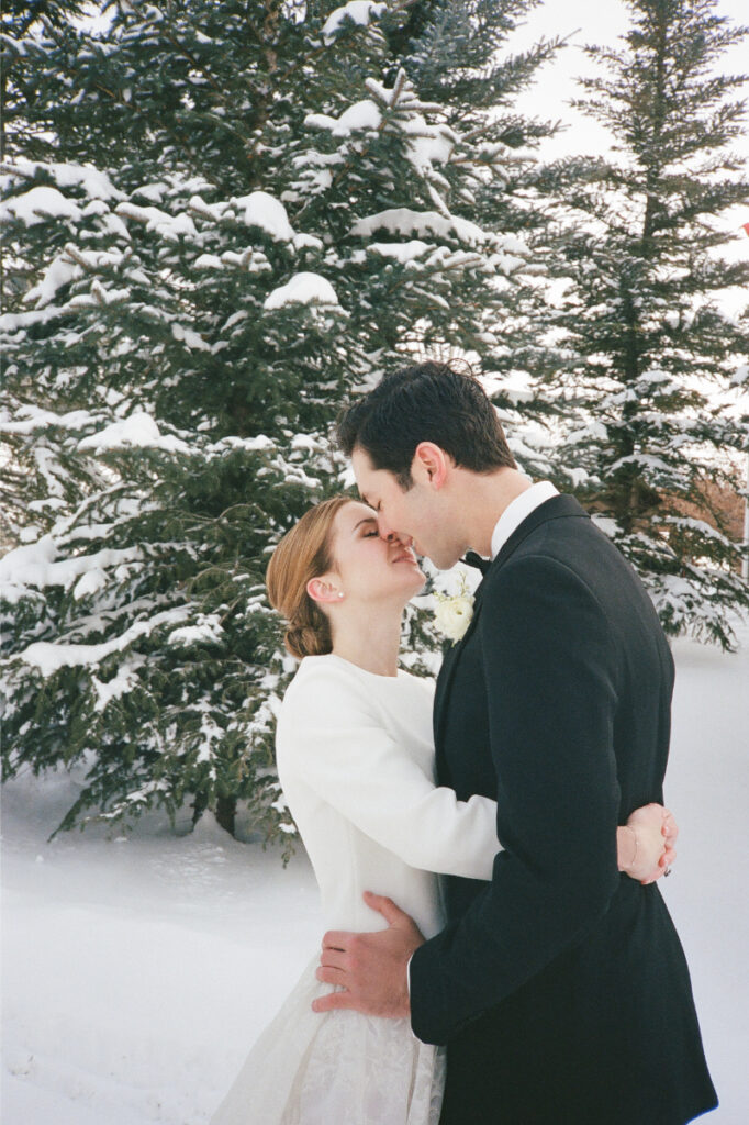 Bride and groom take portraits in one of the most beautiful Wyoming wedding locations.