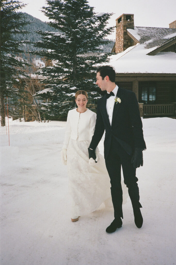 Bride and groom take portraits in one of the most beautiful Wyoming wedding locations.