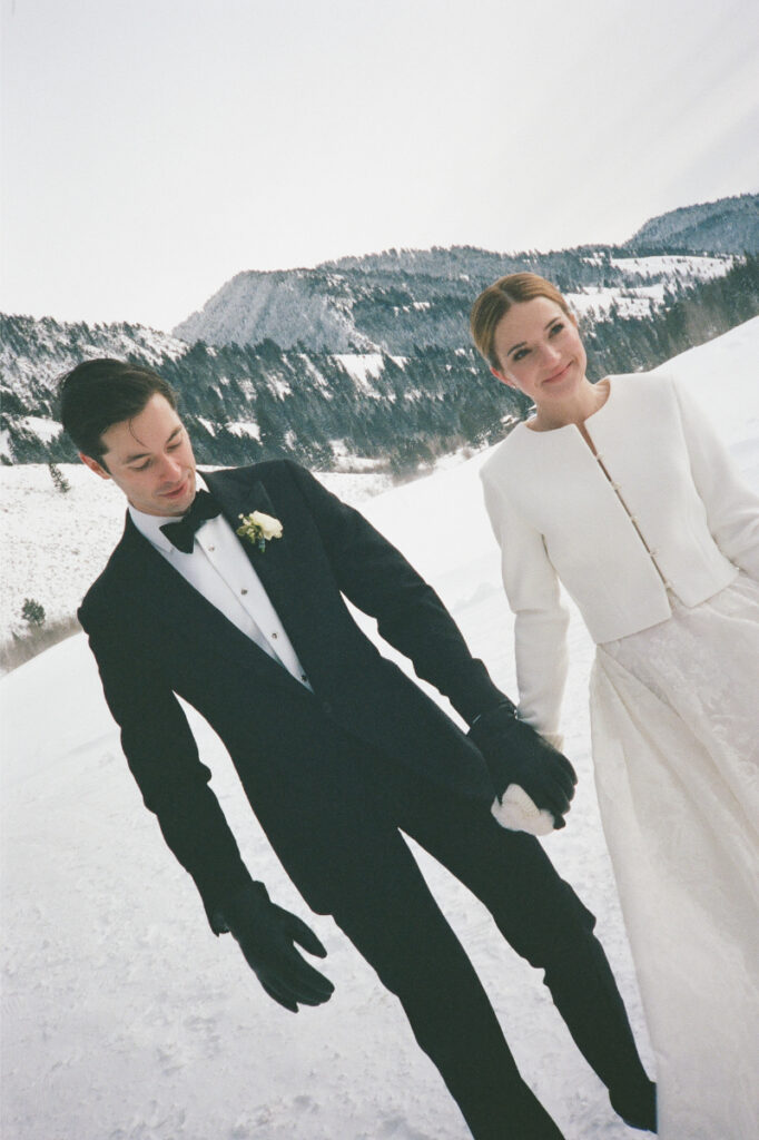 Bride and groom take portraits in one of the most beautiful Wyoming wedding locations.