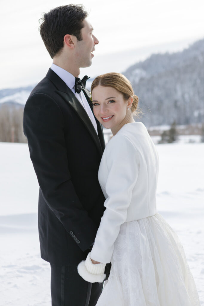 Bride and groom take portraits in one of the most beautiful Wyoming wedding locations.