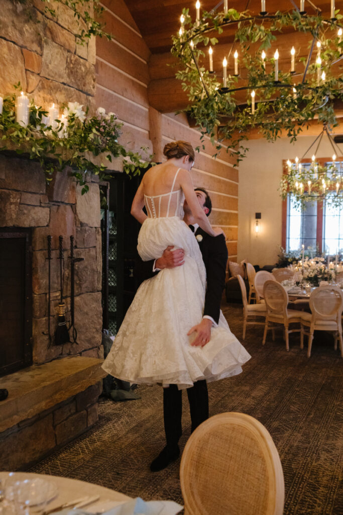 Bride and groom take portraits in one of the most beautiful Wyoming wedding locations.