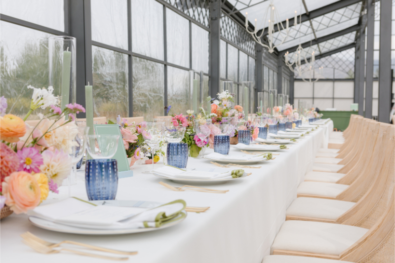 Reception tablescape with bright colors for Wyoming summer wedding.