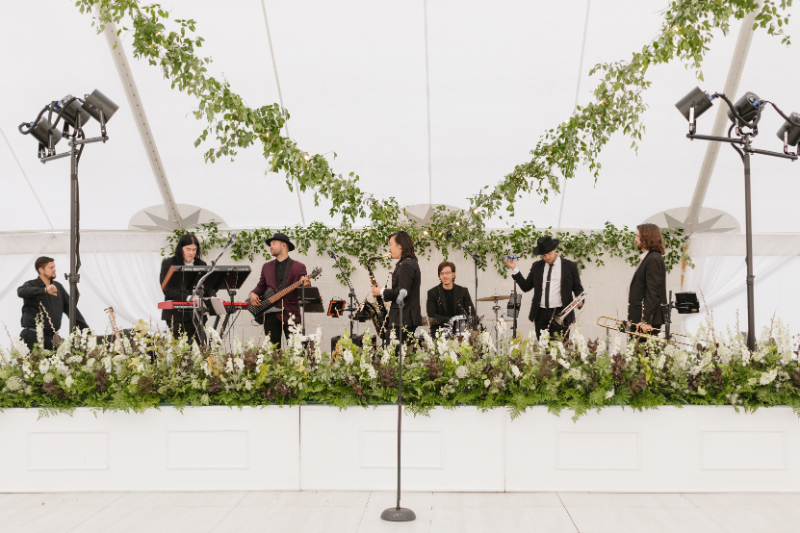 Live band plays music during a Moose Creek Ranch wedding reception.