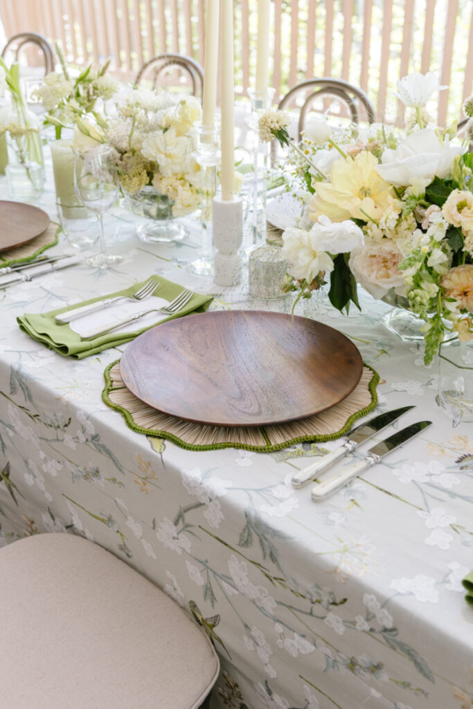 Elegant wedding table setting with floral arrangements and place settings at a Grand Teton wedding reception