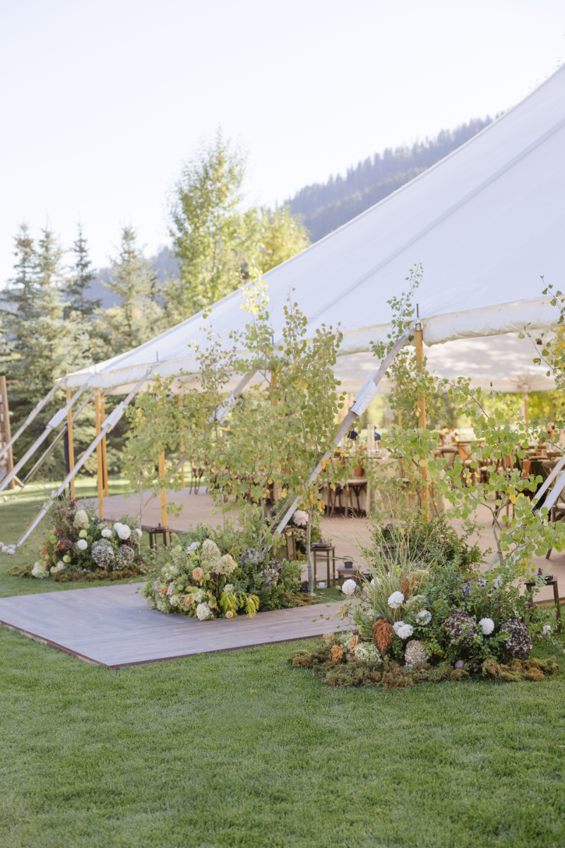 Elegant Wedding tent that over looks Snake River, decorated with flowers.