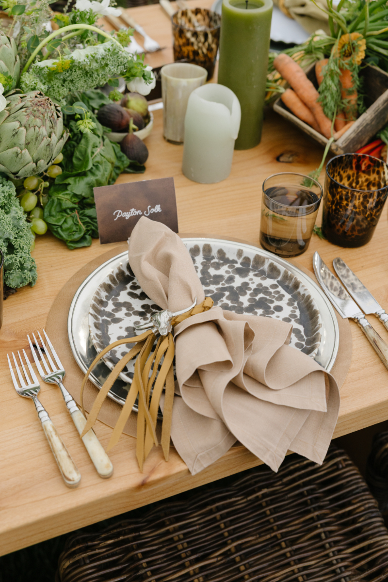 Western-inspired wedding table setting with natural textures and organic details