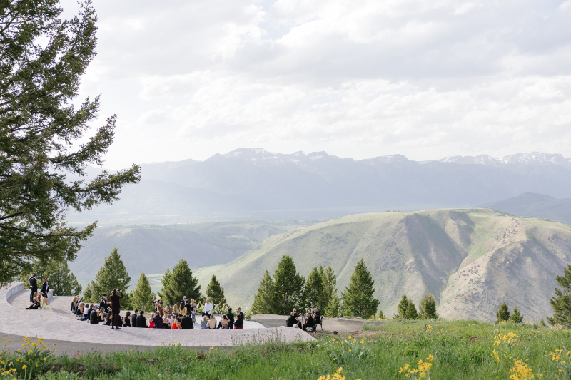 Outdoor ceremony setup overlooking mountains during a wedding in Jackson Hole