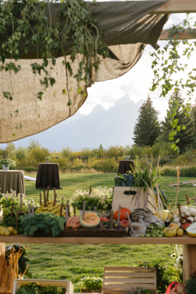Jackson Hole wedding weekend welcome party with mountain views, organic tablescape styling, and elevated farm-to-table details.