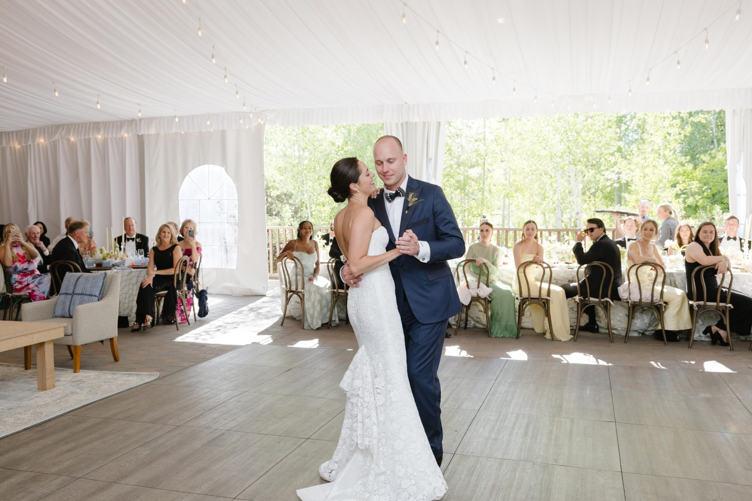 Bride and groom sharing their first dance at their wedding reception.