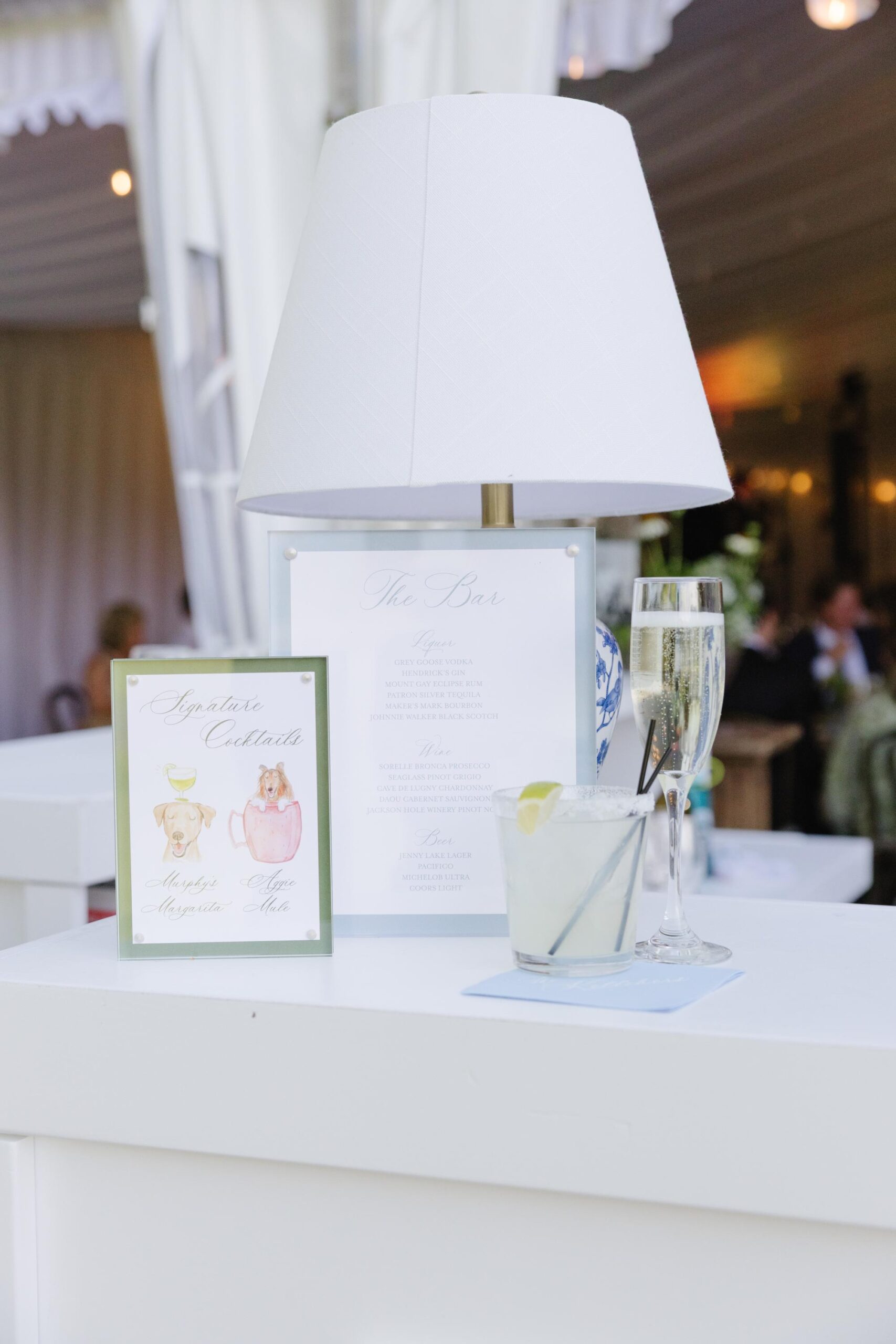 Signature cocktail display with champaign and a cocktail.