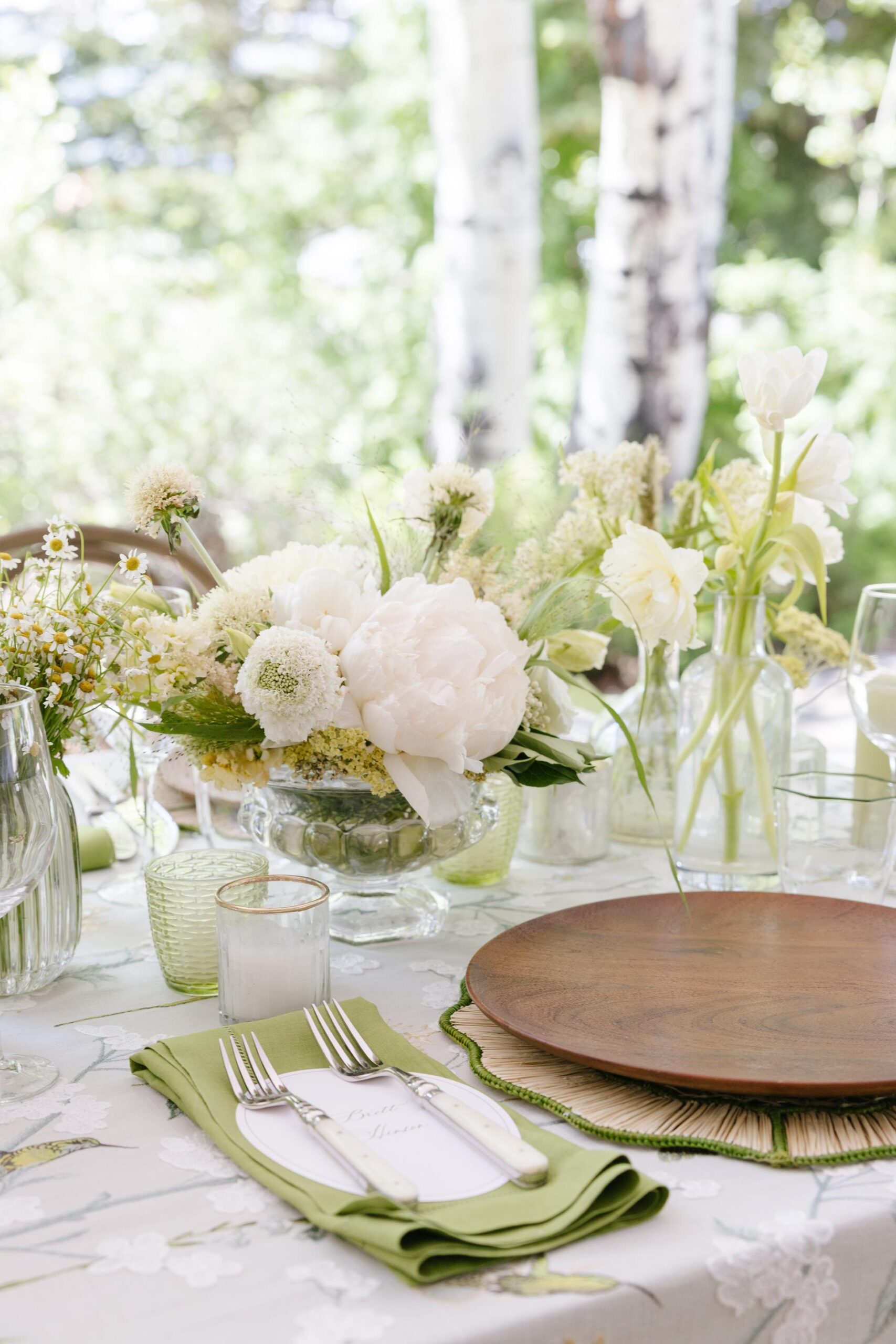 Garden-inspired reception tablescape for the wedding reception decoration.