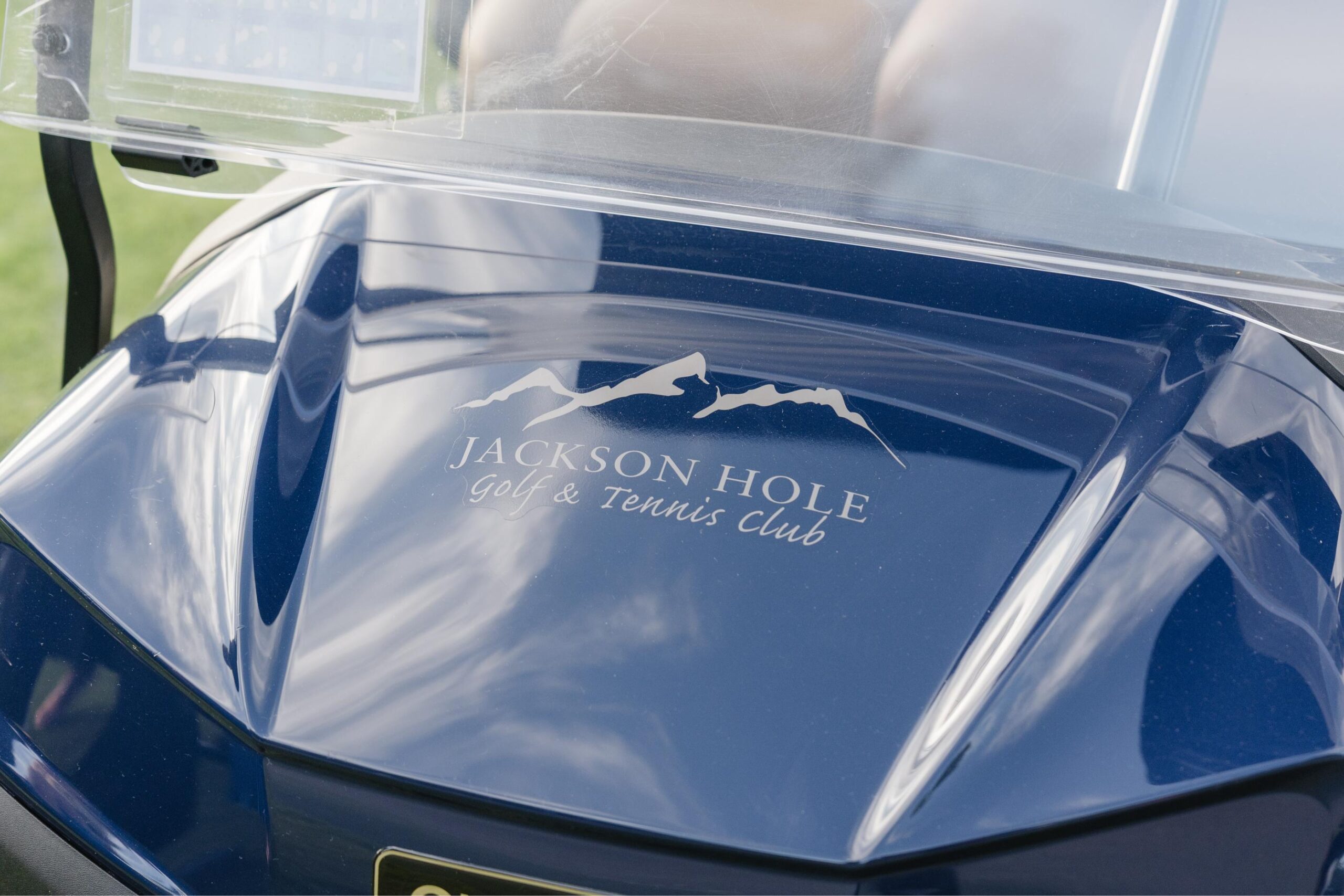 Golf cart at Jackson Hole Golf and Tennis Club during a summer wedding weekend in Jackson Hole.