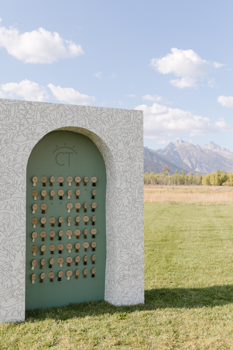 Custom escort card display at Snake River Ranch with Teton Mountain views