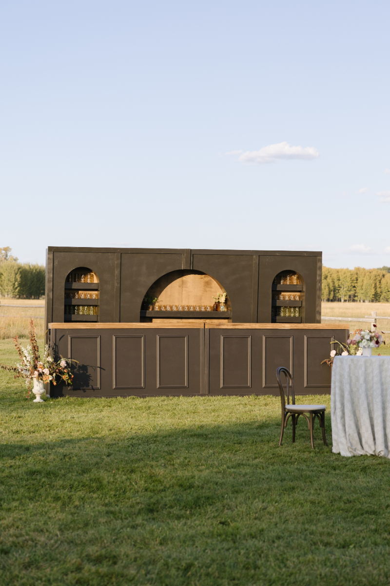 Custom outdoor bar setup for a luxury ranch wedding reception