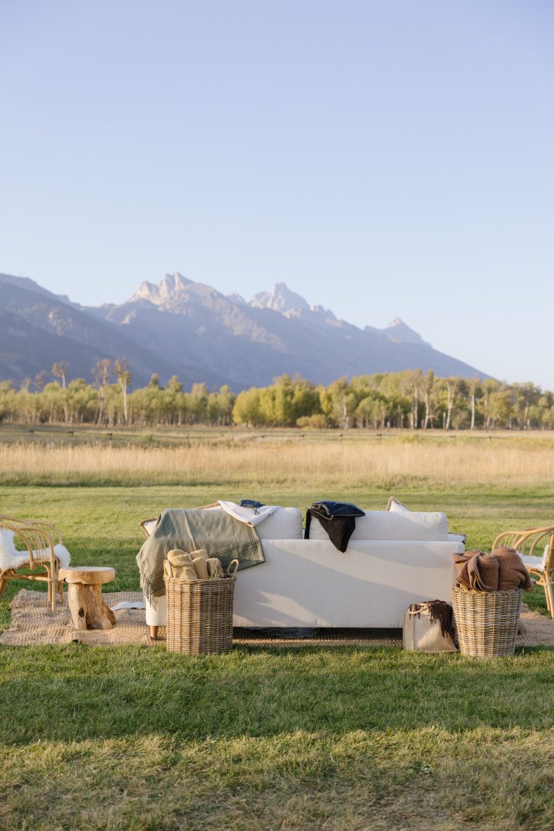 Outdoor wedding lounge with Teton Mountain views and cozy guest seating