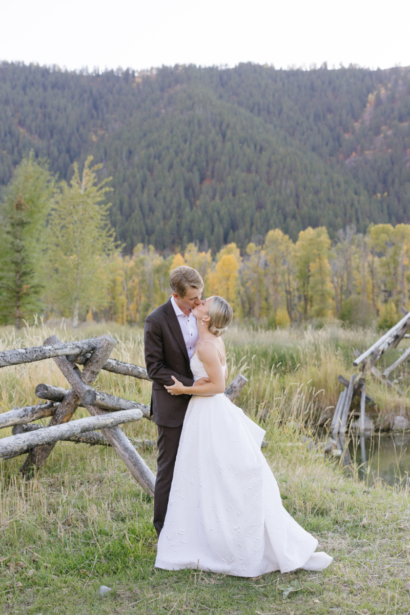 Romantic blue hour wedding portraits surrounded by autumn colors in Jackson Hole