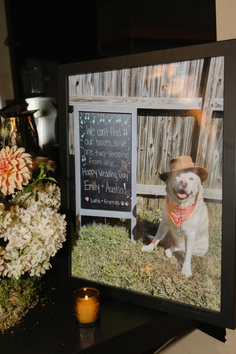 Framed photo of the couple's dog displayed as a personal wedding detail at Snake River Sporting Club