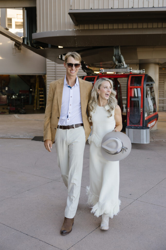 Couple arriving at their welcome party at Jackson Hole Mountain Resort's Rendezvous Lodge