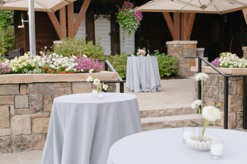 Wedding ceremony ideas with guests walking to an outdoor ceremony surrounded by Jackson Hole mountain scenery.