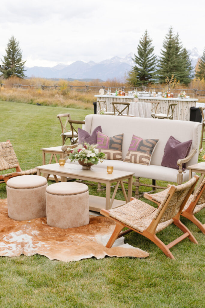 Wedding ceremony ideas with a cozy outdoor lounge overlooking the Grand Tetons for guests to gather and celebrate.