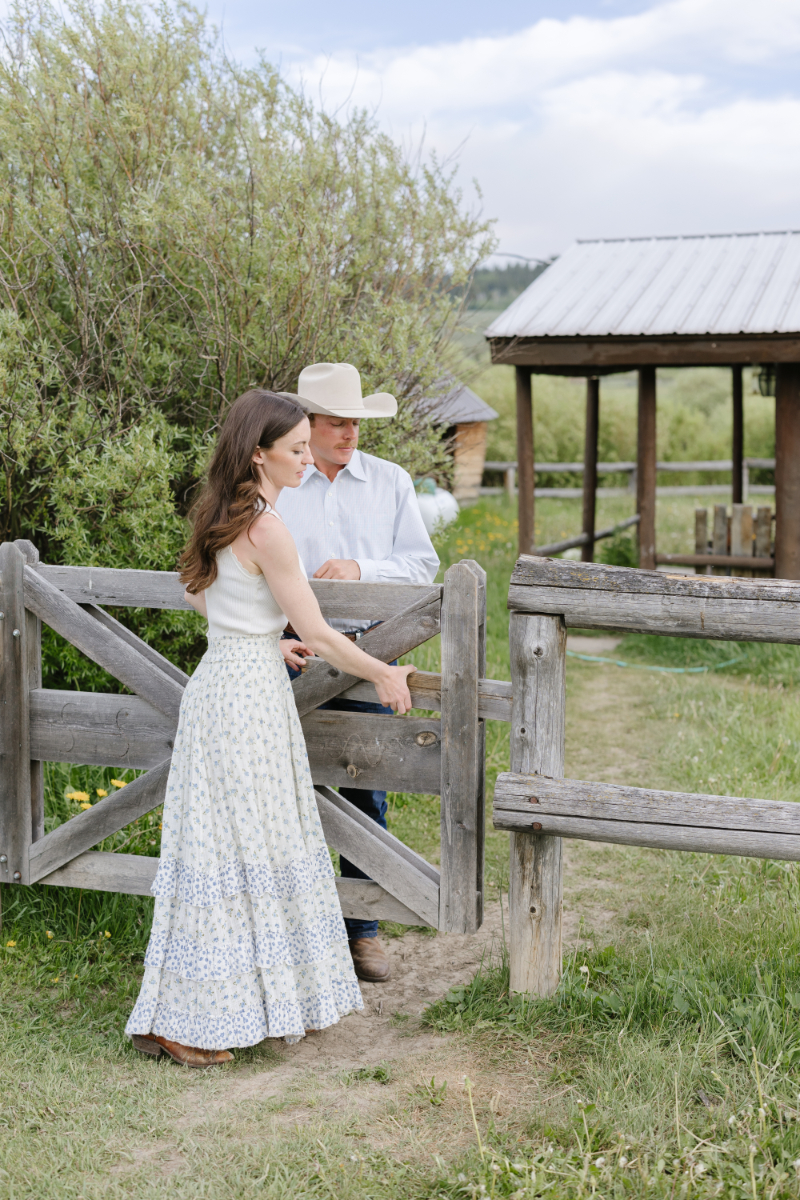 Couple at a rustic ranch during their Jackson Hole engagement session