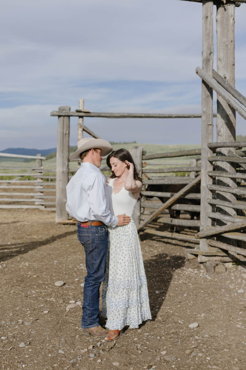 Couple embracing at a Wyoming ranch near Grand Teton National Park