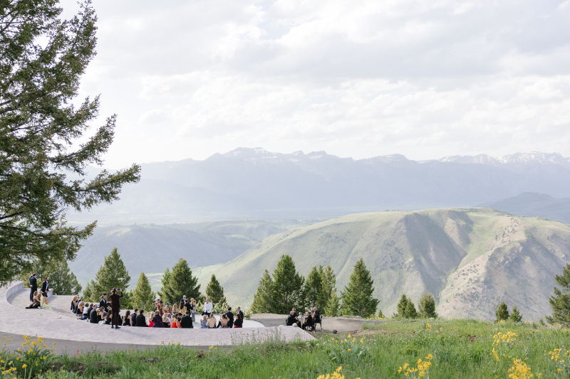 Outdoor wedding ceremony overlooking the Teton Mountains from Spring Creek Ranch in Jackson Hole, Wyoming.